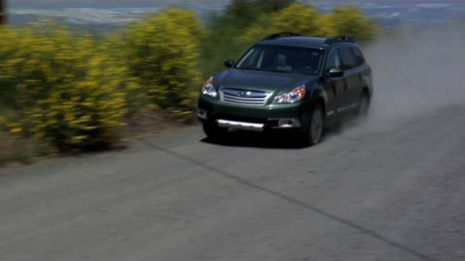 Subaru Outback On Street And Dirt